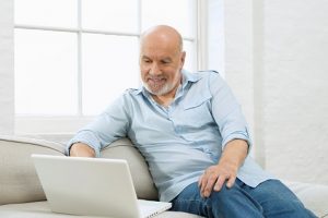 man-researching-air-conditioner-sizing